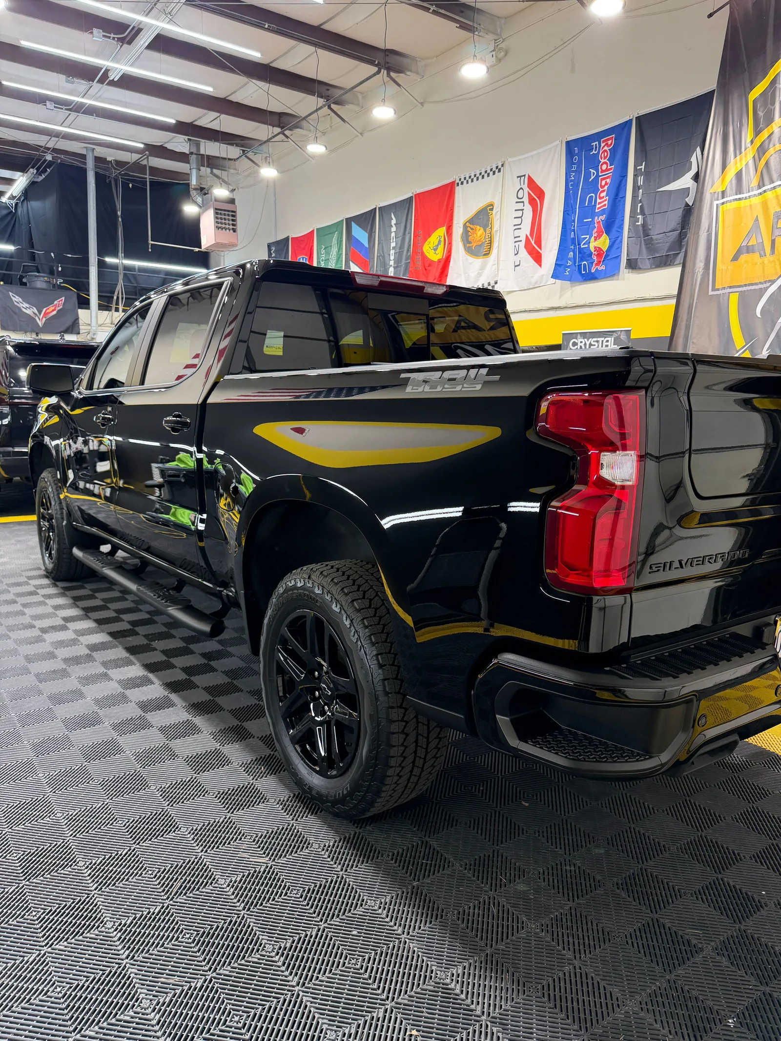 Window tinting on vehicle at Aristocrat Detailing Kansas City