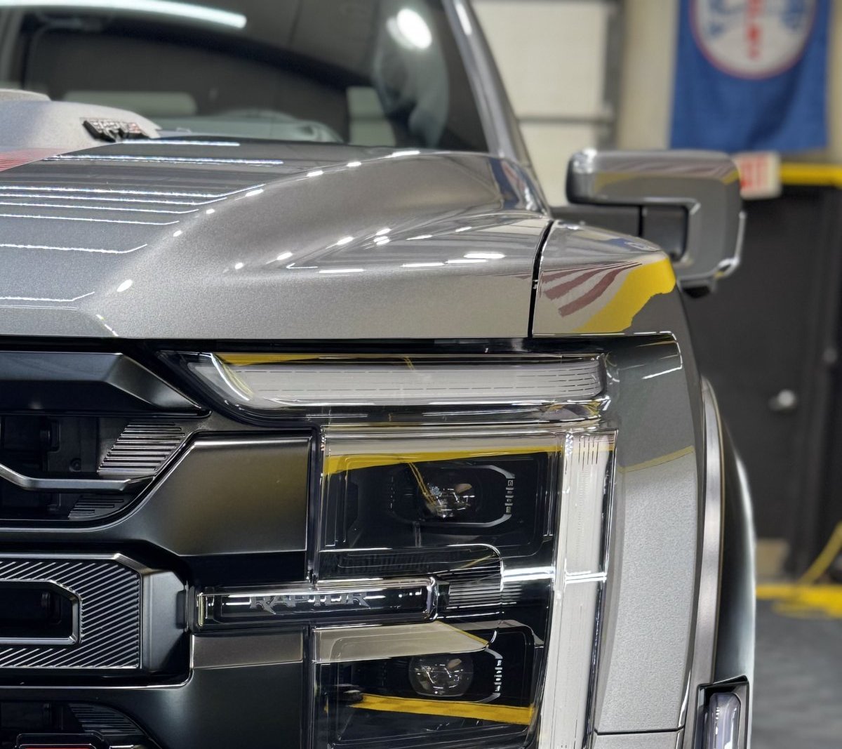 Light Coating - Close-up of Raptor headlight with LED